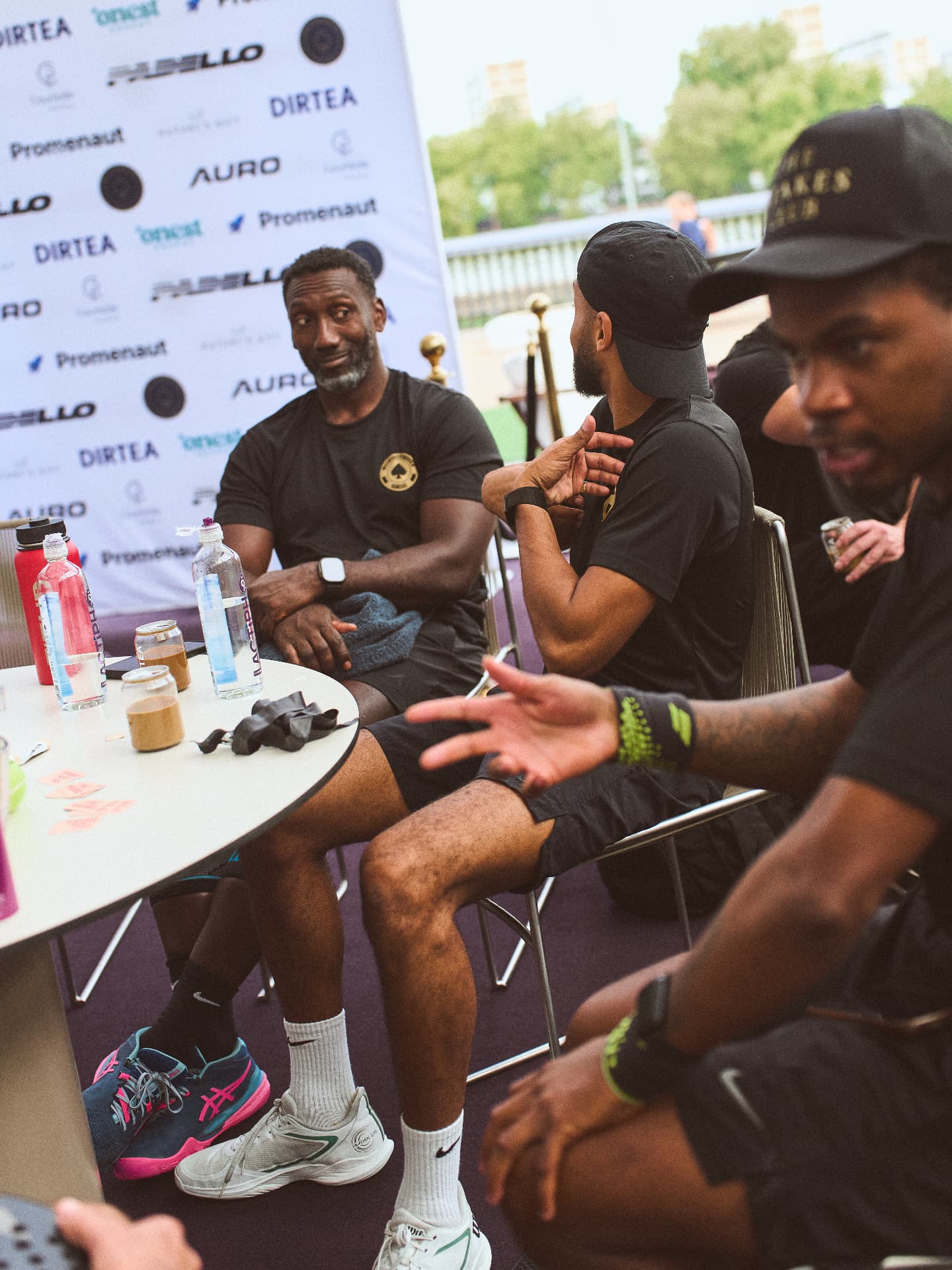 Members talking around a table at a Stakes Club event